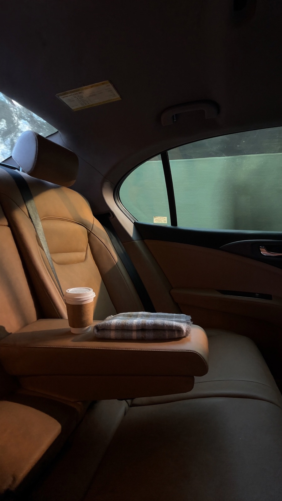 Chauffeured car backseat location